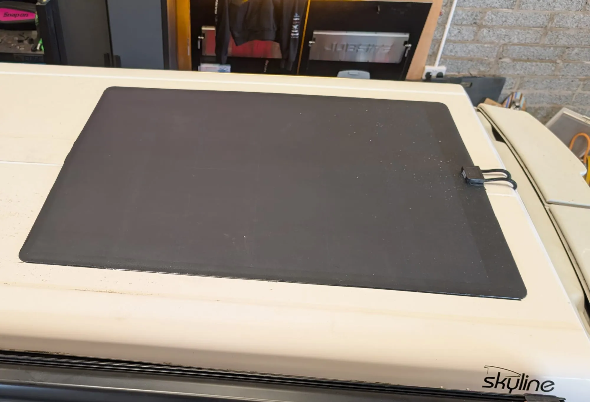 Lightweight solar panel fitted to a motorhome roof